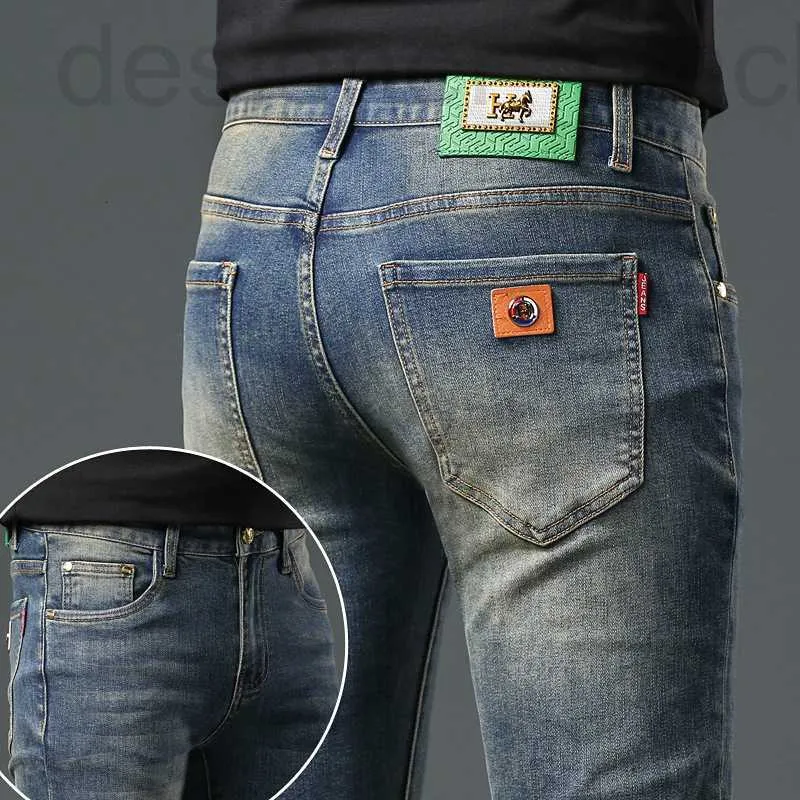 Jeans masculinos jeans de grife H marca jeans de alta qualidade, ajuste fino masculino pequeno tubo reto elástico calças compridas casuais, calças de versão coreana modernas e versáteis 73Q2