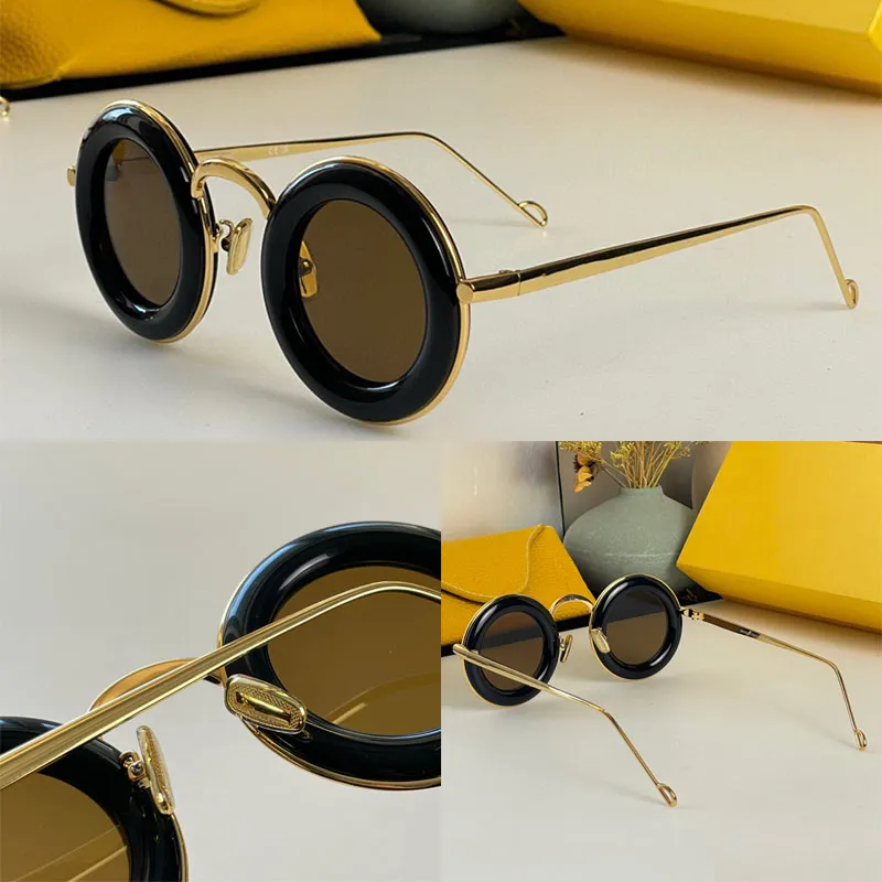 Fritidsmän och kvinnors designer högkvalitativ krökad metallram solglasögon guldmetallben 40094U söt flerfärgad rundram gafas de sol strandfester semester