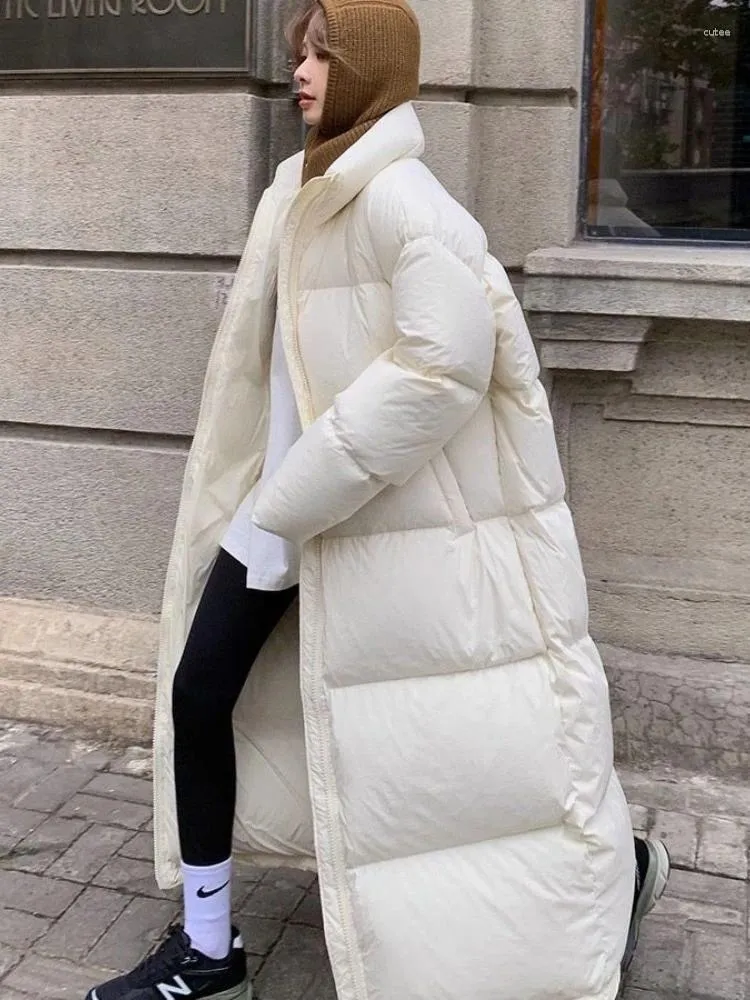 Damskie okopy płaszcze zimowe stojak na mody kołnierz biały długi płaszcz parkas kobiety 2023 Casual zamek błyskawiczny gęsty ciepły czarny płaszcz dam
