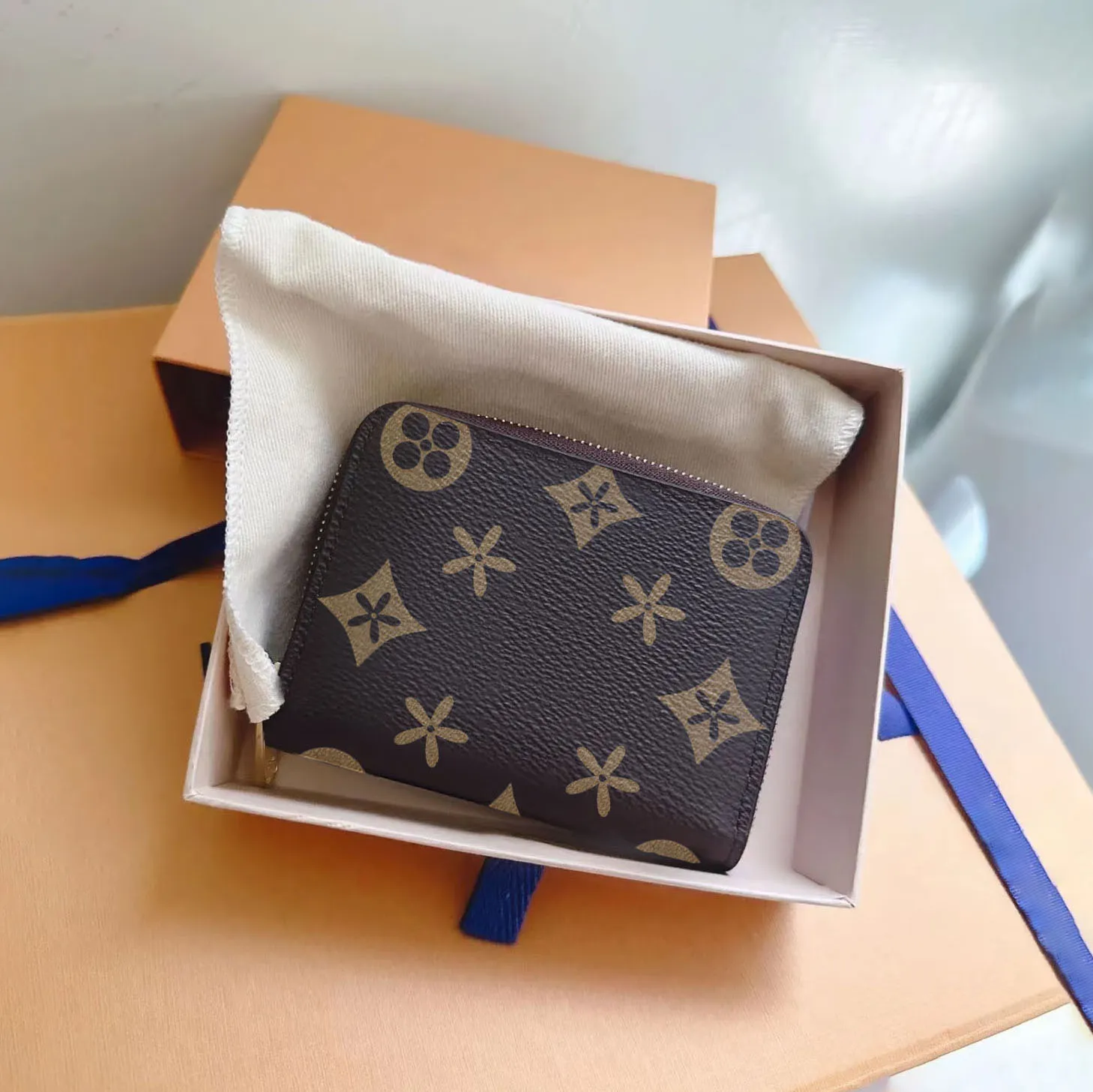 Äkta läderspegel Kvalitet Nyckel Plånböcker Zippy Zip Coin Purse M60067 N63070 Kvinnor Korthållare Man Key Pouch Black Flower Designer präglade lyxvävkorthållare