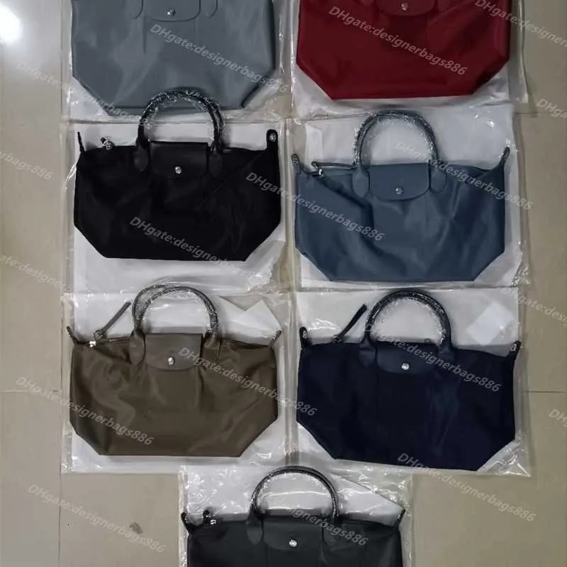 Sacs Cross-body groothandel schoudertas 95% korting Winter dikke dameswinkel Dumpling Bags Effen Saccoche Kleur Opvouwbaar Dame Opruiming Nylon Vrije tijd Moeder Dokter Handtas