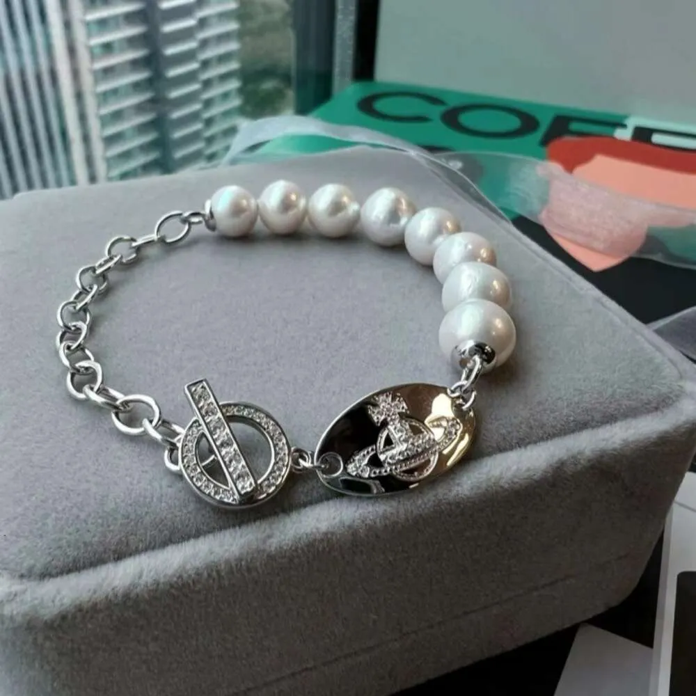 Designer de haute qualité 23 New Western Empress Dowager Diamond Oval Pearl Bracelet pour la mode féminine, petits objets artisanaux polyvalents, légers et haut de gamme