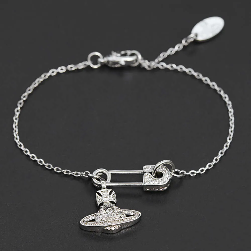 Broche cloutée en diamant de l'impératrice douairière Xi de haute qualité, conception de niche à chaîne fine Saturne, bracelet planète à la mode, accessoire féminin