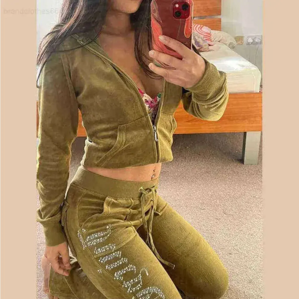 Kvinnors träningsdräkter Juicy Tracksuit 2023 Summer Brand Suit Veet Velor Women Track Hoodies and Pants Met 688SS Fashion