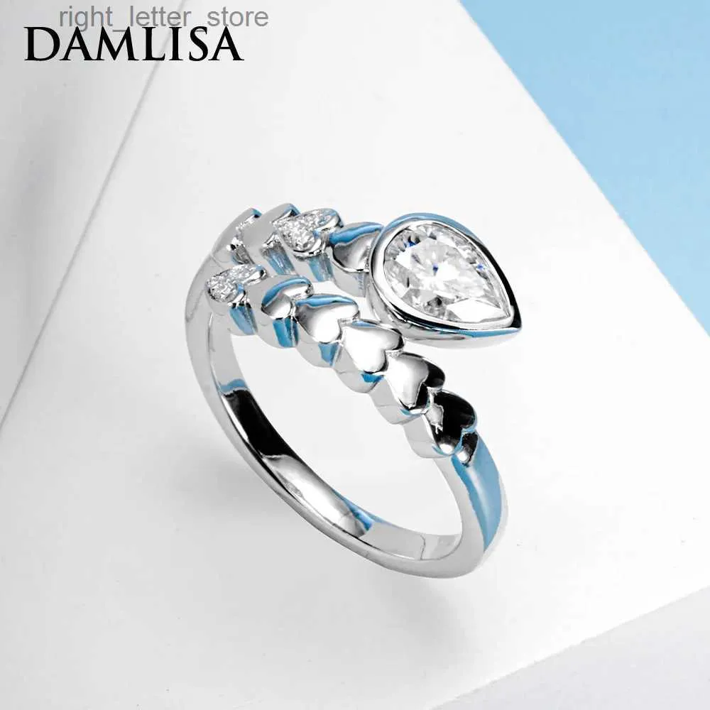 サイドストーンdamlisa 1ct d color vvs1 pear cut moissaniteウェディングバンドリング925スターリングシルバーヘビ型女性用2ストーンオープンリングyq231209