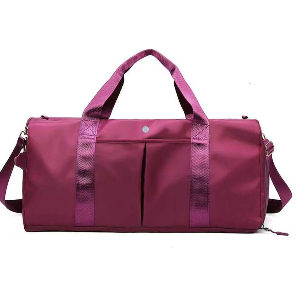 Seyahat lululemens debriyaj çantası büyük keepall bagaj gövdesi duffle lüks tasarımcı çanta moda haftalık kadın çanta naylon omuz erkekler kayış fg