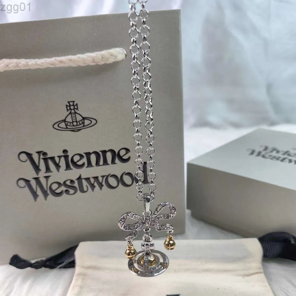 Designer Viviene Westwoods Nouveau Viviennewestwood Impératrice Douairière Xi 3d Saturn Bow Bell Collier Lumière De Luxe Mode Planète Collier Haute Édition