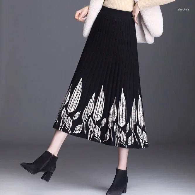 Kjolar 2023 stickade kvinnors a-line kjol mitt i hösten vinterlånga wrap höft hög midja tryckta flickans vita blad