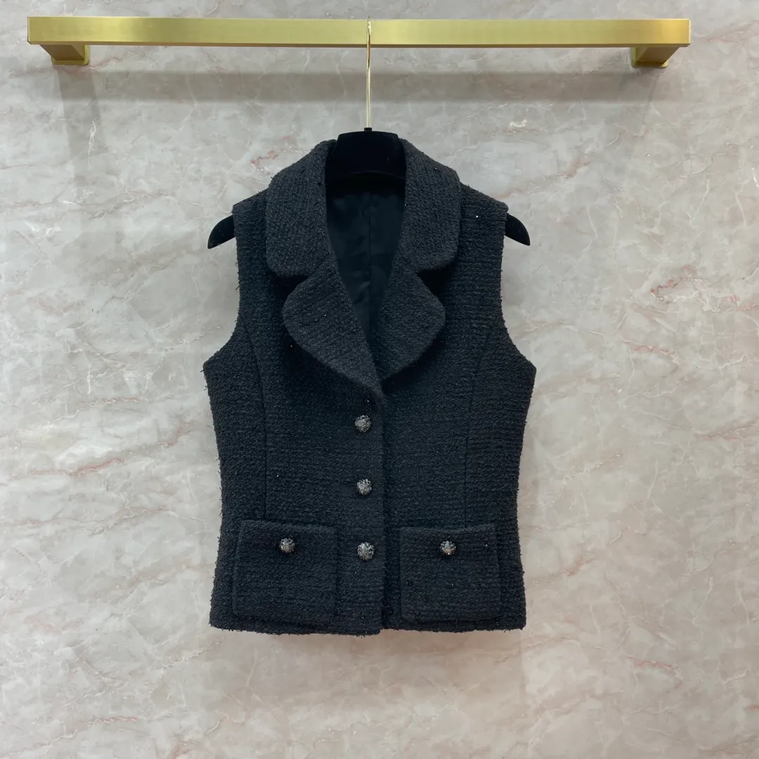 2024 Chaleco negro de lana con cuello de solapa para mujer, chaquetas sin mangas con botones y bolsillos de diseñador para mujer 1211678