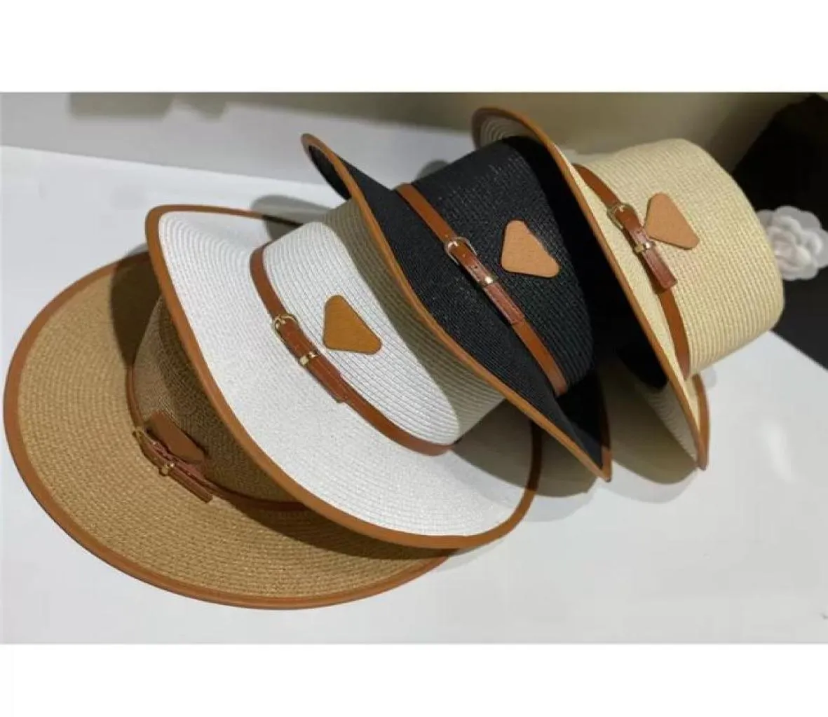 Diseñador de moda para mujer Sombreros de cubo Casquette Summe Strawhat Sombrero de paja de playa de ala ancha de lujo para mujeres Gorros Gorros Holiday Cap9936502