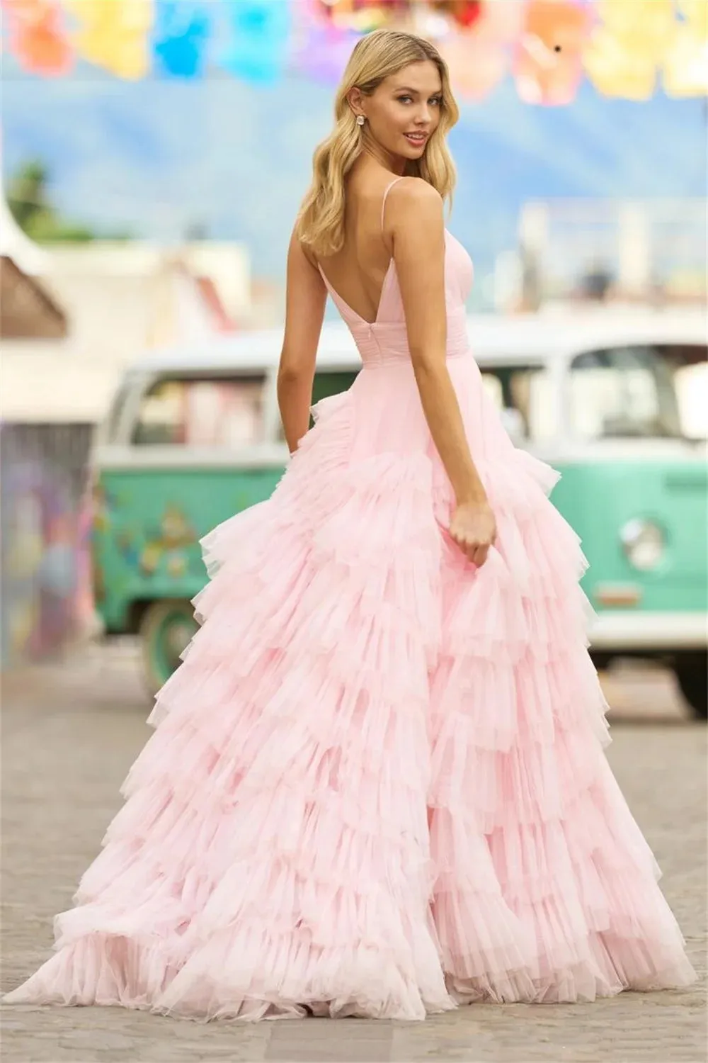 Elegant and romantic Multilayer Princess Tiered Tulle Ball Gown with Deep V-Neck, Straps, Ruffles, and Tulle. Elegant and romantic Multilayer Princess Tiered Tulle Ball Gown with Deep V-Neck, Straps, Ruffles, and Tulle.