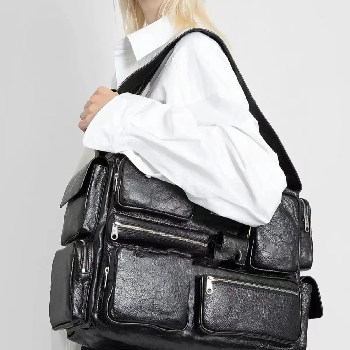 DHgate.com:Large Sling Bag in Black Arena Lambskin with Aged
