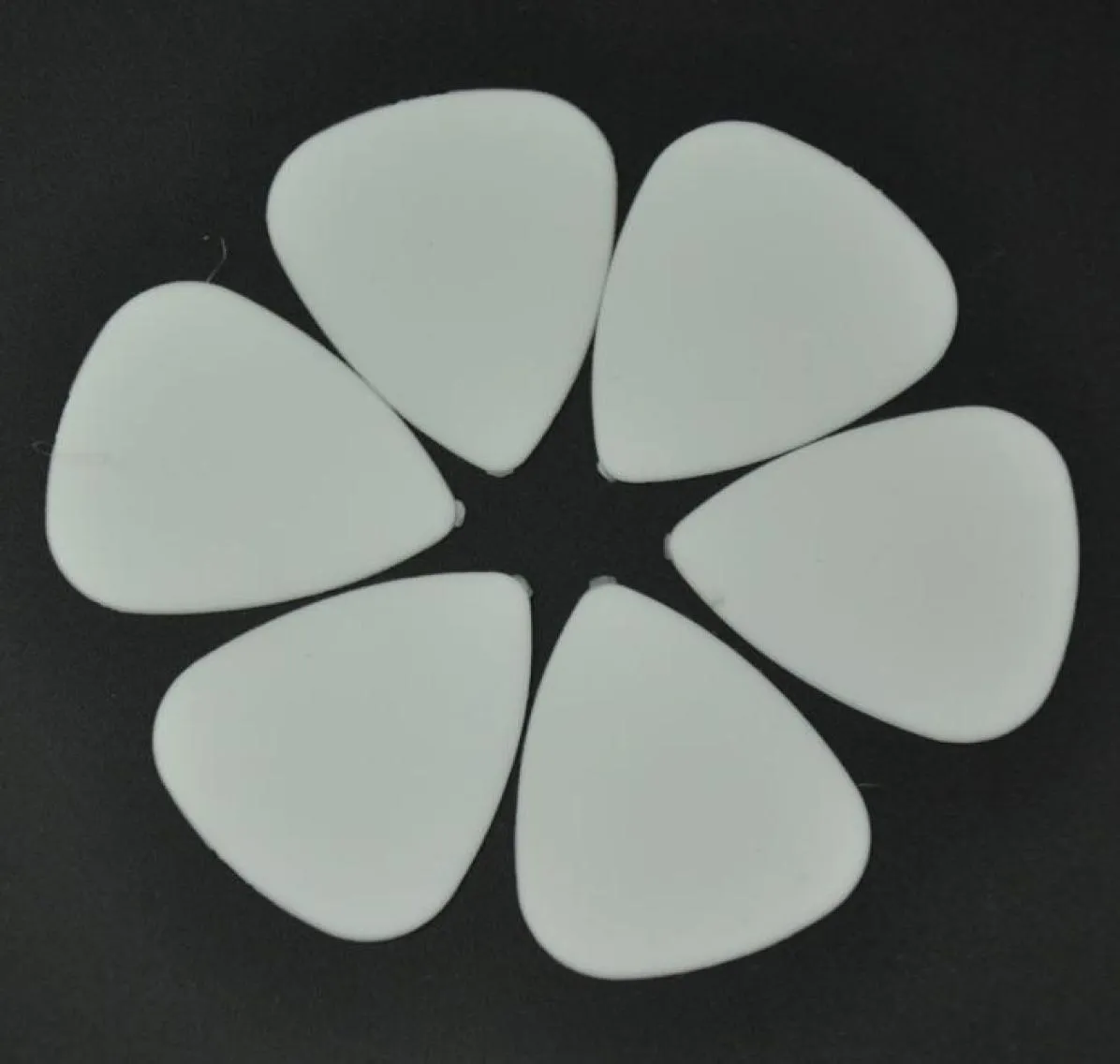 100 st nytt medium 071mm ABS Guitar Picks Plectrums Matte White5709723