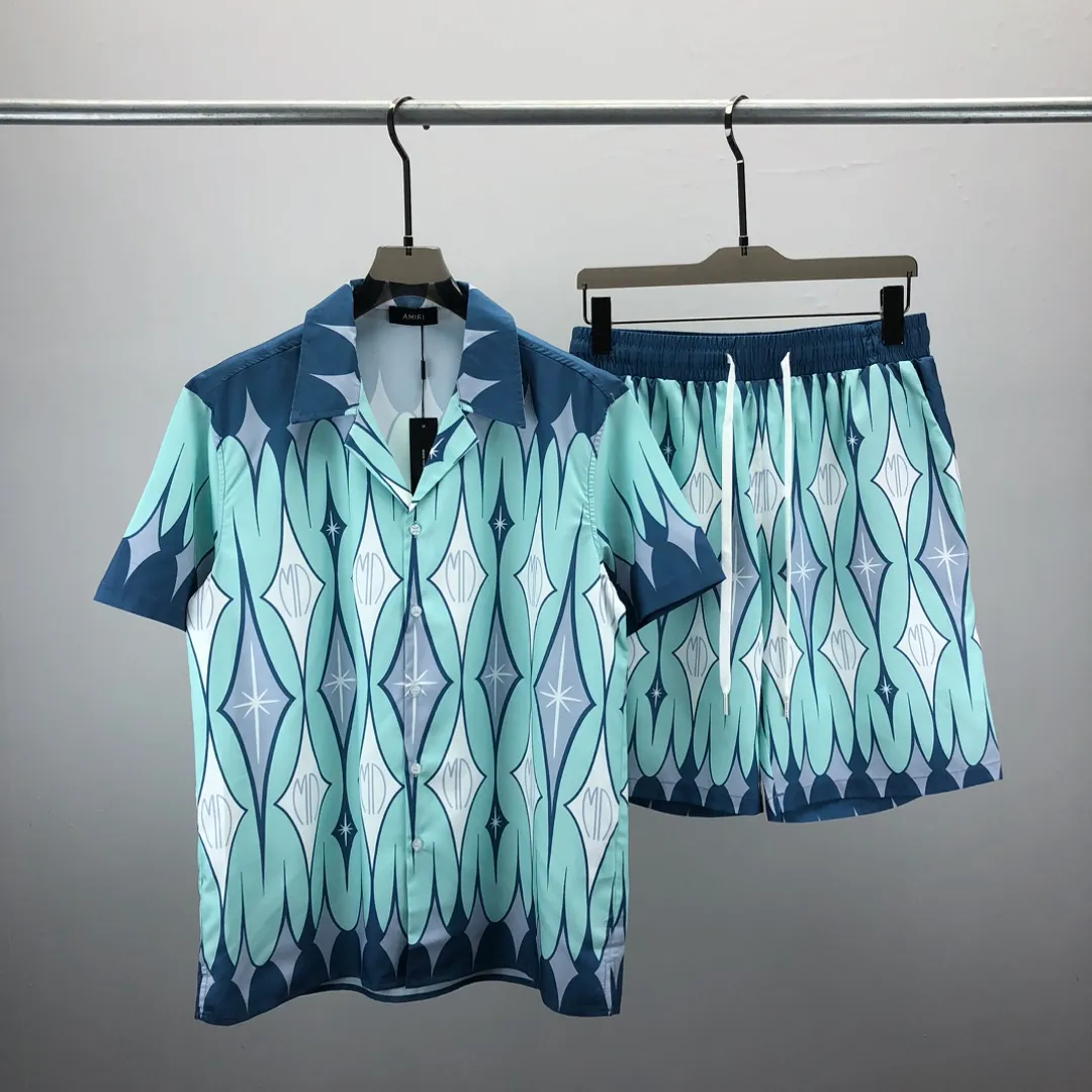 2023デザイナーメンズカジュアルシャツ +ファンシービーチショーツメンズファッションTシャツセータートラックスーツパーカー