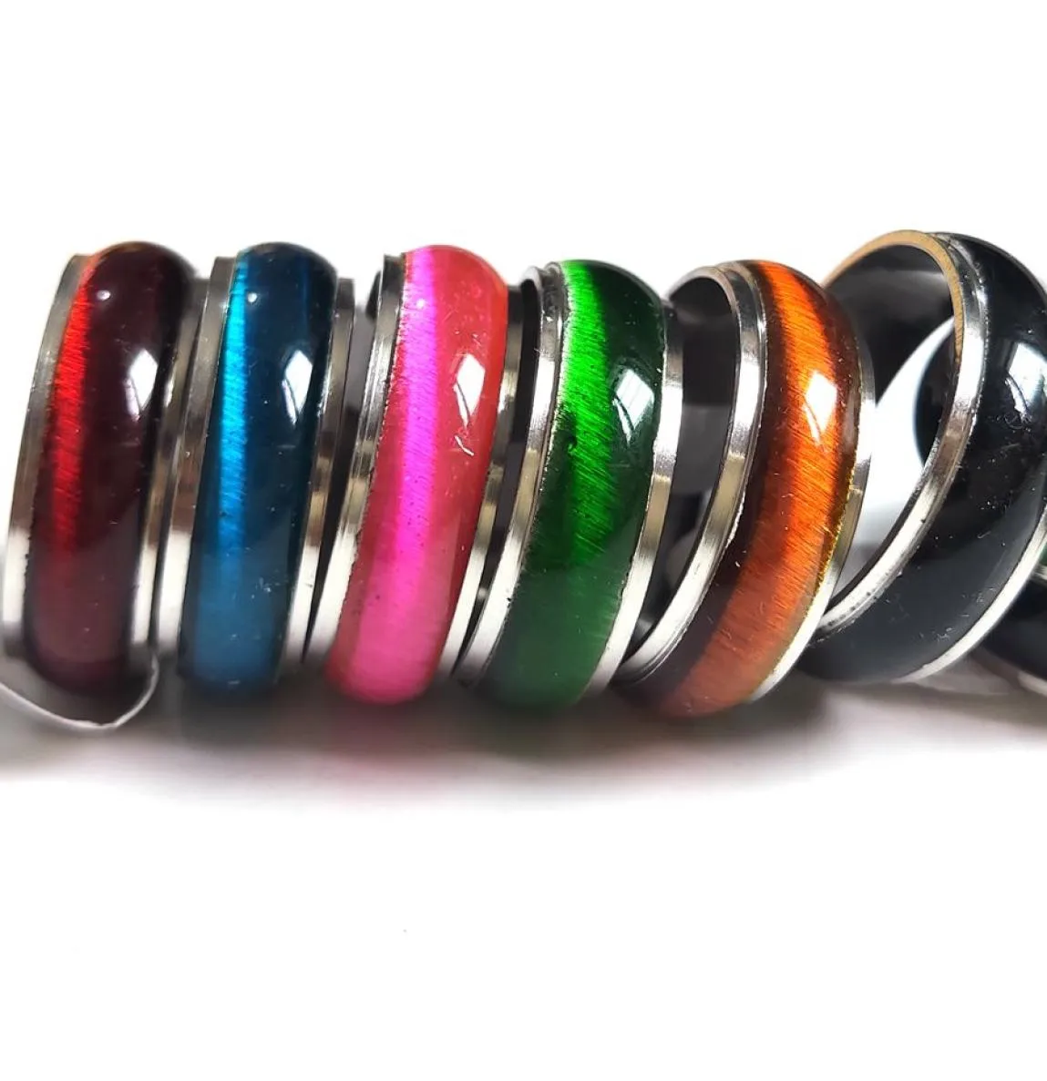 Bulkpartijen 100 stuks gemengd heren dames kleurrijke band Cat Eye roestvrijstalen ringen breedte 7 mm bandmaten geassorteerd hele mode Jood5382592