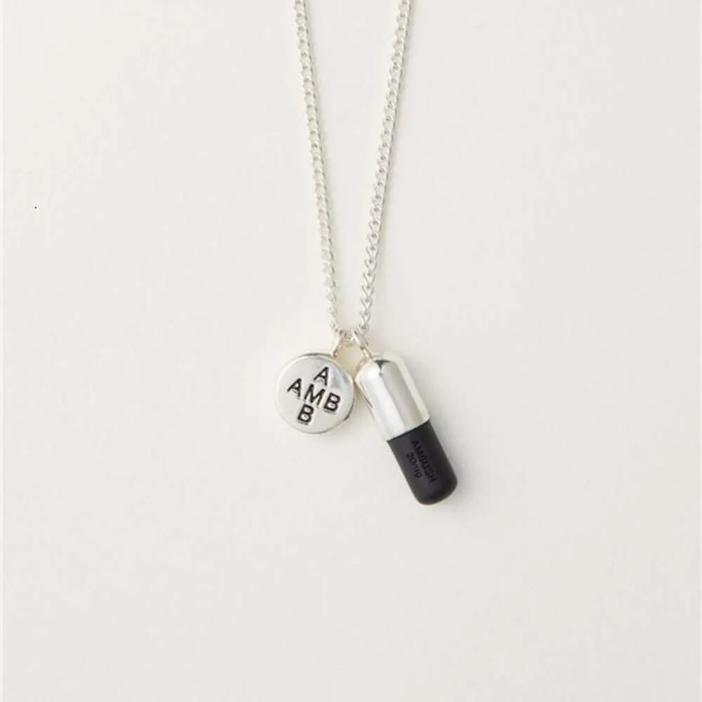 DHgate.com:AMBUSH Pill Capsule Charm Necklace for Men - 2 DHgate.com:AMBUSH Pill Capsule Charm Necklace for Men - 2