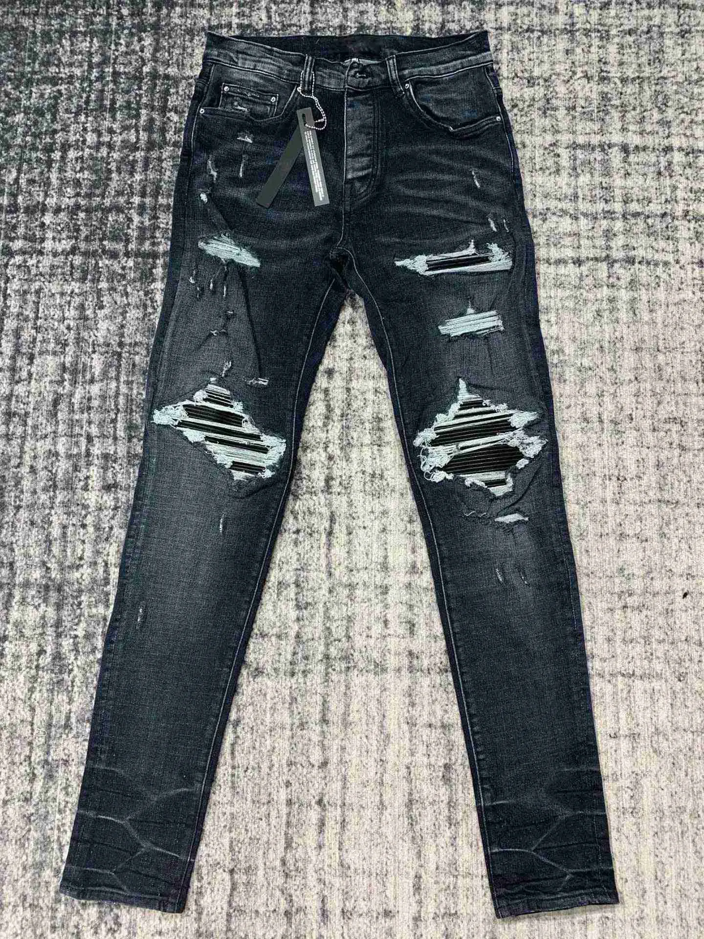 Mäns jeans diskonterade män ribbade lappar MX1 ​​nödställda jeans Q231212