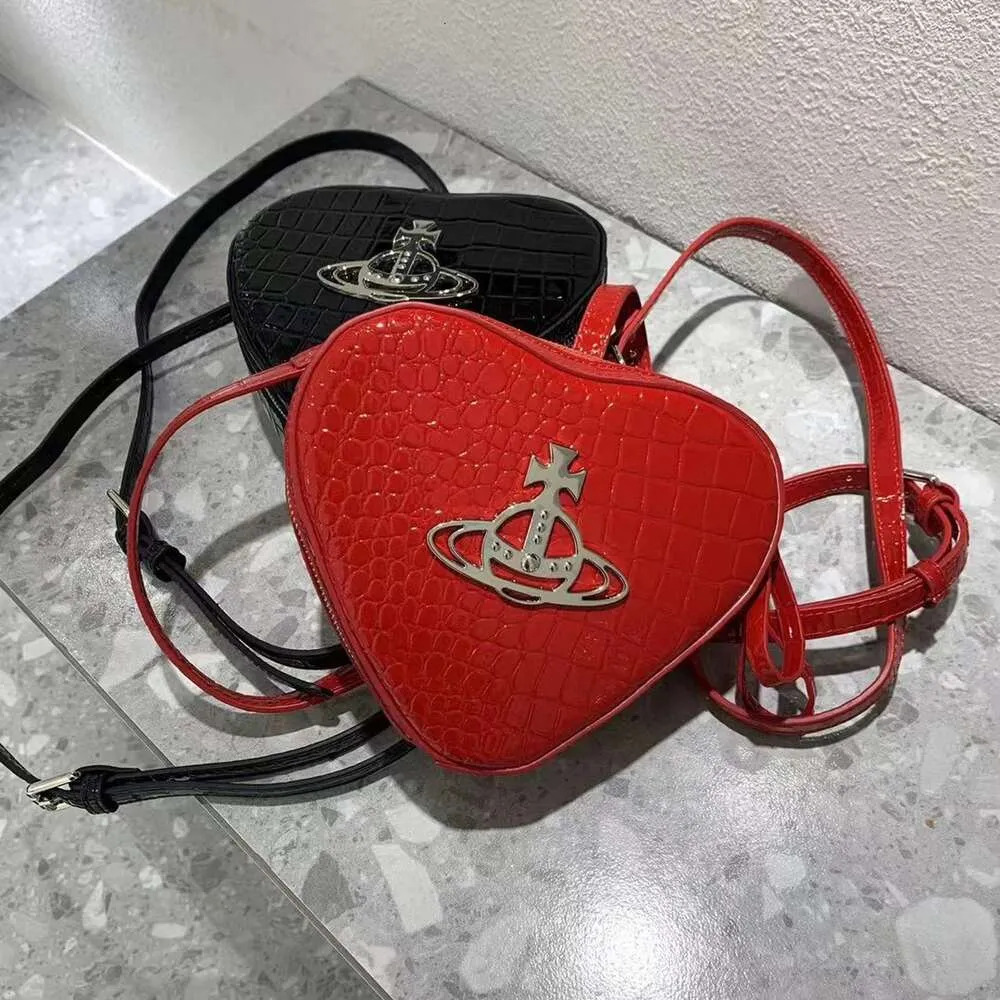 24SS Designer Viviene Westwoods Bag Viviennewestwood Baobao Womens New Type Xi Empress Dowager Simple and Trendy Crossbody Bag Small Design Solid Color Versatile O