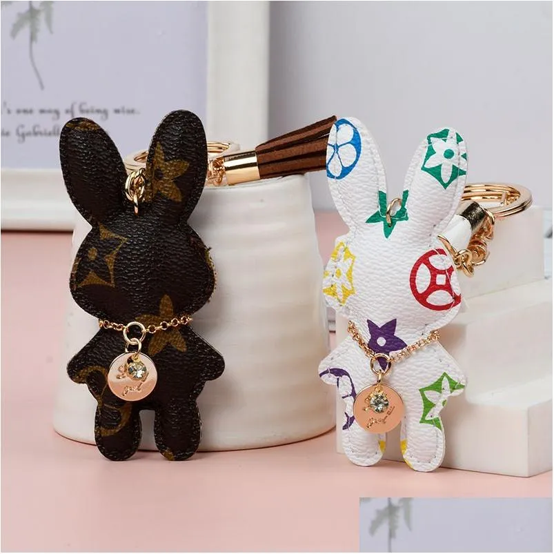 Key Rings Rabbit Bunny Keychains Women Cute Brown Flower Plaid Pu Leather Car Keyrings Holder Fashion Design Bag Chains Jewelry Access Dhawi