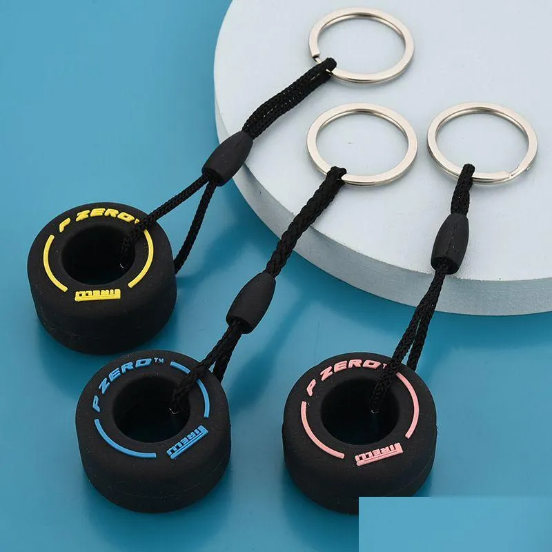 Schlüsselanhänger Mode Simulation Reifen Schlüsselanhänger Kreative Uni Tasche Anhänger Schmuck Charms Geschenk für Autoliebhaber Weiches PVC Cartoon Mini Schlüsselanhänger Ch Dh5Ks
