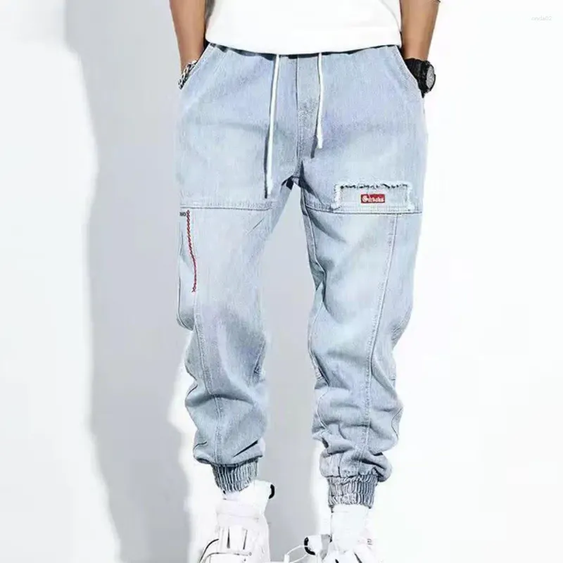 Herr jeans streetwear hip hop last byxor män solid färg rippade elastiska midja avslappnade lösa leggings harem