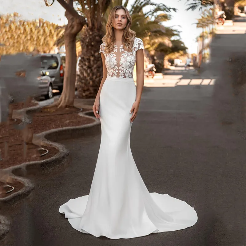 Abiti da sposa con bottoni ricoperti senza schienale per le donne Sweep Train alla moda Classico gioiello a maniche corte Illusion Sirena Applique