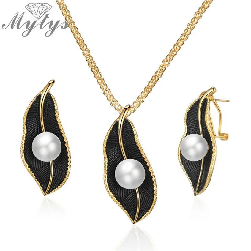 Mytys Pearls Necklace On Black Leaf Jewelry Sets For Women Retro Romantic Gold Wire Frames Leaf Pendant Earrings CE611CN5402491