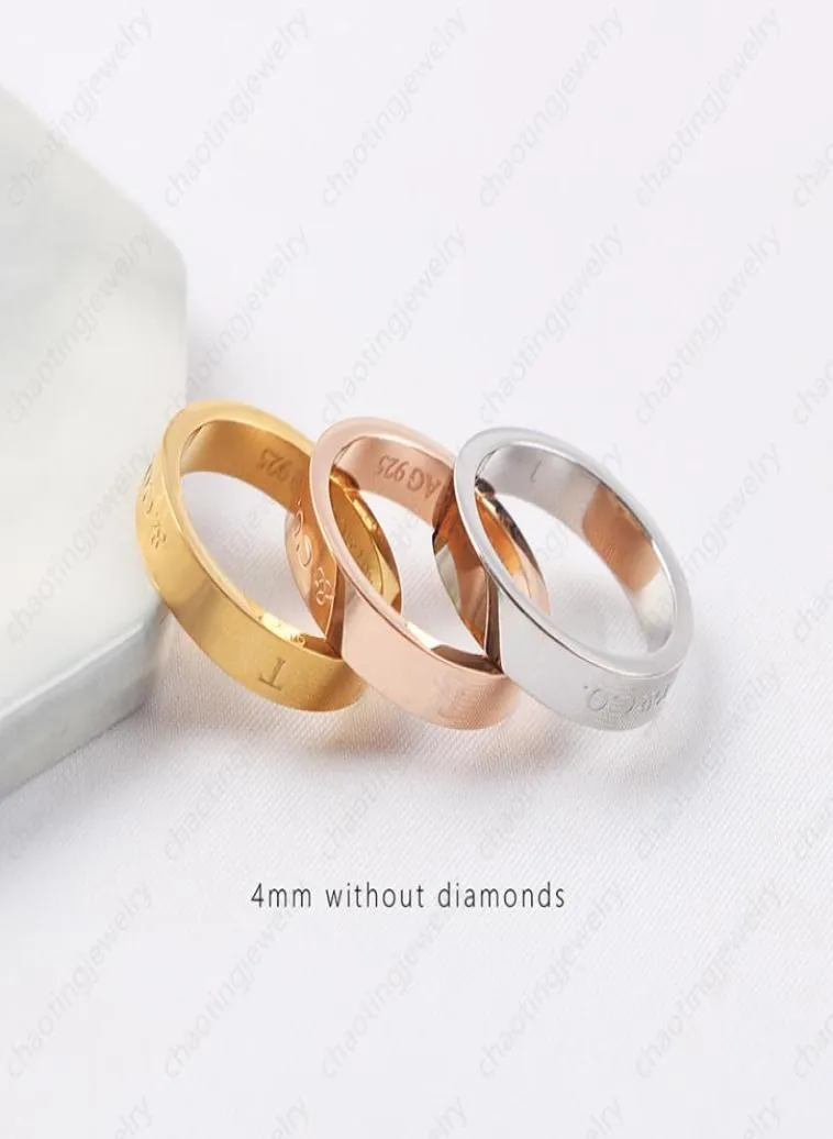 ダイヤモンドと電気めっきされた18Kのファッショナブルなカップルが施された金色のリングは、軽い豪華なジュエリーを備えています5122556