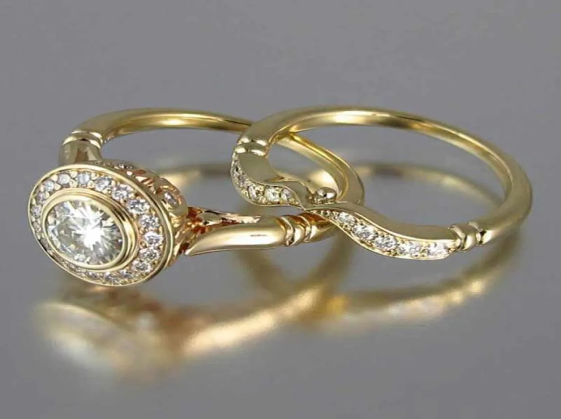 Golden Color 2PC Bridal Ring sätter romantiska förslag Viggringar Foe Kvinnor Trendiga runda steninställningar hela lots9491318