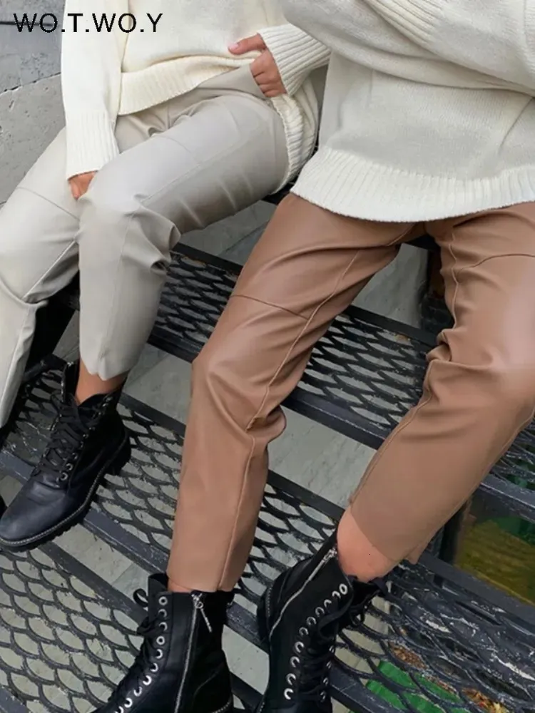 Calças femininas capris wtwoy cintura alta emendado solto calças de couro feminino outono sólido cordão calças de couro do plutônio feminino calças retas femininas 231212