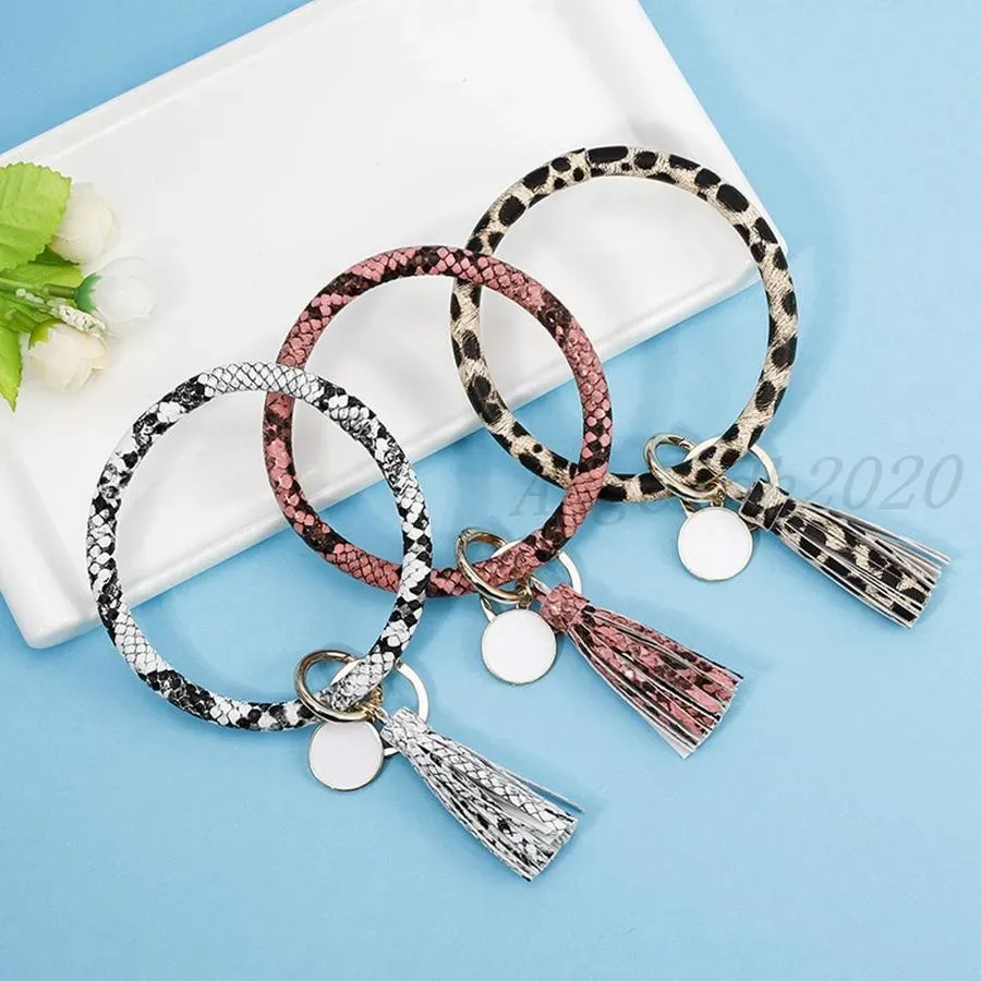 Bomboniera con ciondoli con nappe braccialetti con fibbia chiave braccialetti avvolgenti in pelle pu catena chiave anello braccialetto multi colore rra2118 gratuito