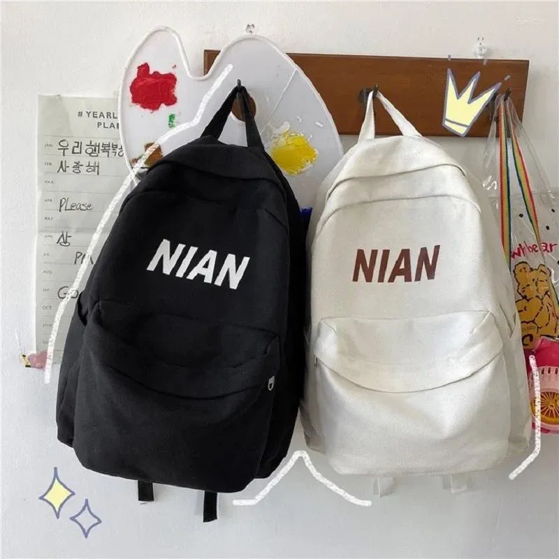 Bolsas escolares de color sólido japonés mochila minimalista mochila escolar mujeres versátiles impermeables para hombres