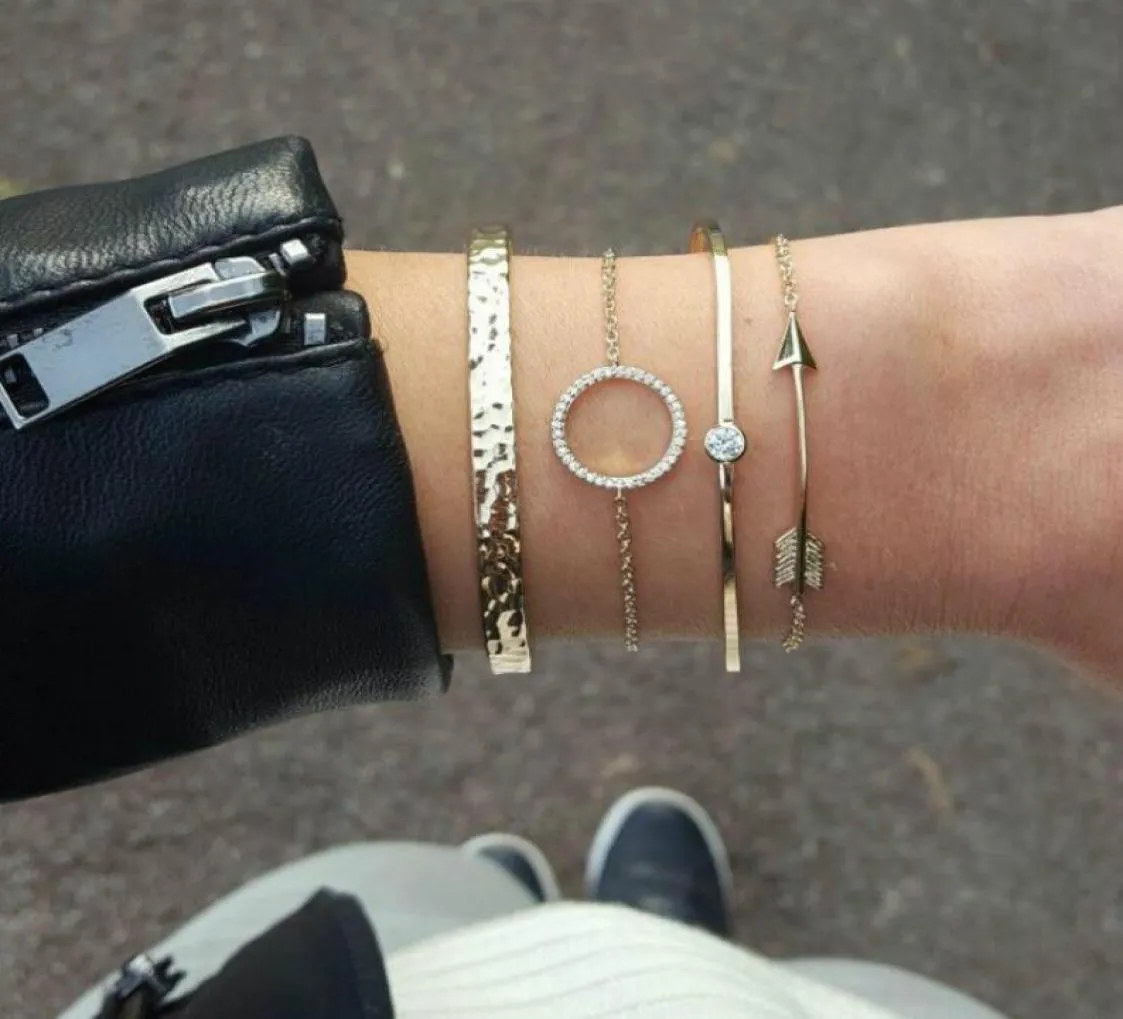 Nya modekristallarmband Kvinnor Cirkulär pil är konkav och konvex armband armbandskombination fyra hela3185450