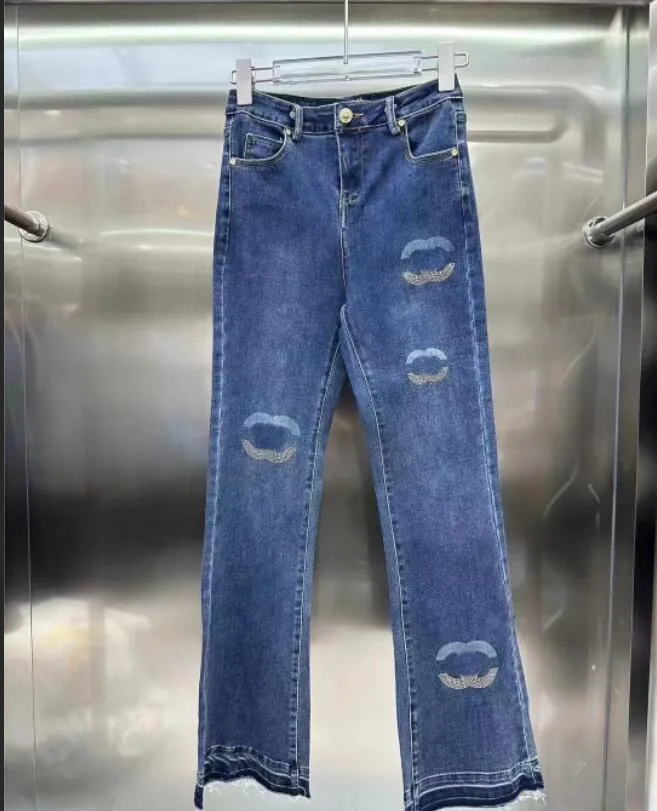 Projektantka damskie dżinsy o wysokiej stroju chude niebieskie dżinsowe spodnie szeroko nogawkowe kobiety C list haftowy jesień i zimowe dziewczyny 8Soh