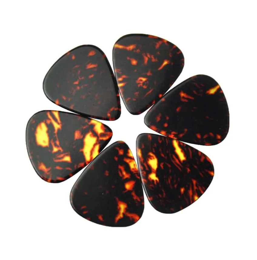 Dużo 100pc ciężkie 096 mm puste gitarę Plectrums Brak wydruku Celluloid Brown Tortoise1673919