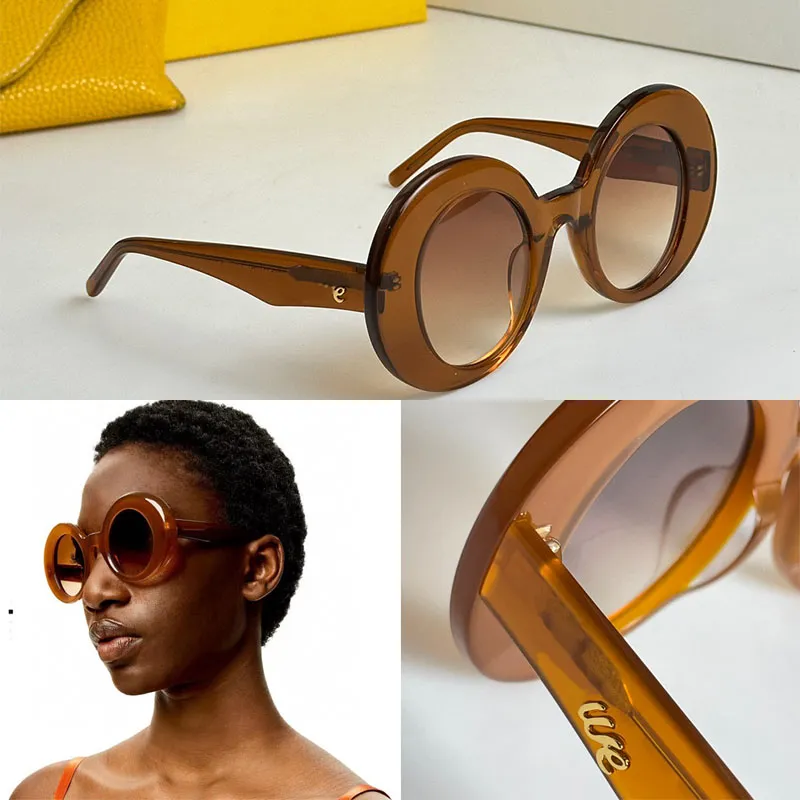 Runde Fashion-Runway-Sonnenbrille, spezieller Rahmen, gebogene Scheiben, Bügel verziert mit Buchstabensymbolen aus Metall 40089, geeignet für Männer und Frauen