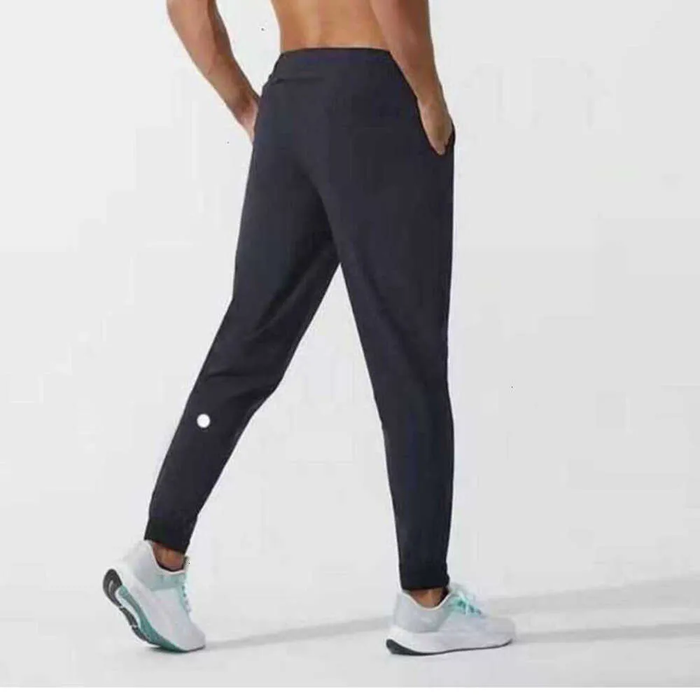 Lulus limones leggings alinear hombres pantalones traje de yoga deporte de secado rápido cordón gimnasio bolsillos pantalones de chándal pantalones para hombre casual cintura elástica diseñador Lululemen 64565ess