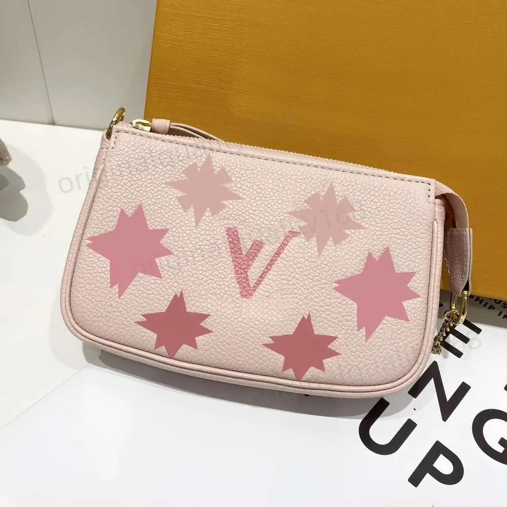 European Original Mini Pochette Accessoires Pink Depiction High Crossbody  Chain Bag For Women Genuine Leather Pink Handheld Bag With Quality Appeal  From Mirrorluxurybag, $279.33 | DHgate.Com