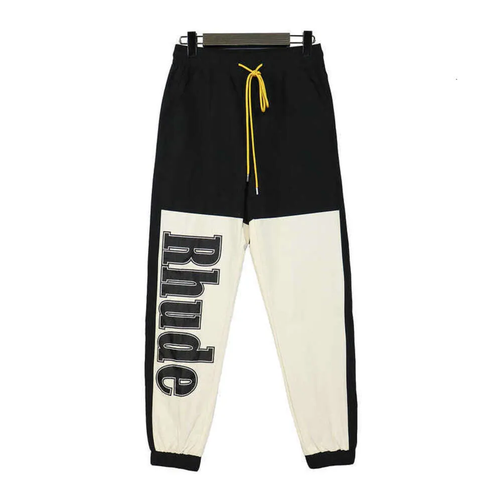 designer tech polaire RHUDE pantalon en nylon hip hop tendance grippe couleur coutures contrastées sport décontracté leggings lâches hommes streetwear Jogger pantalons de survêtement