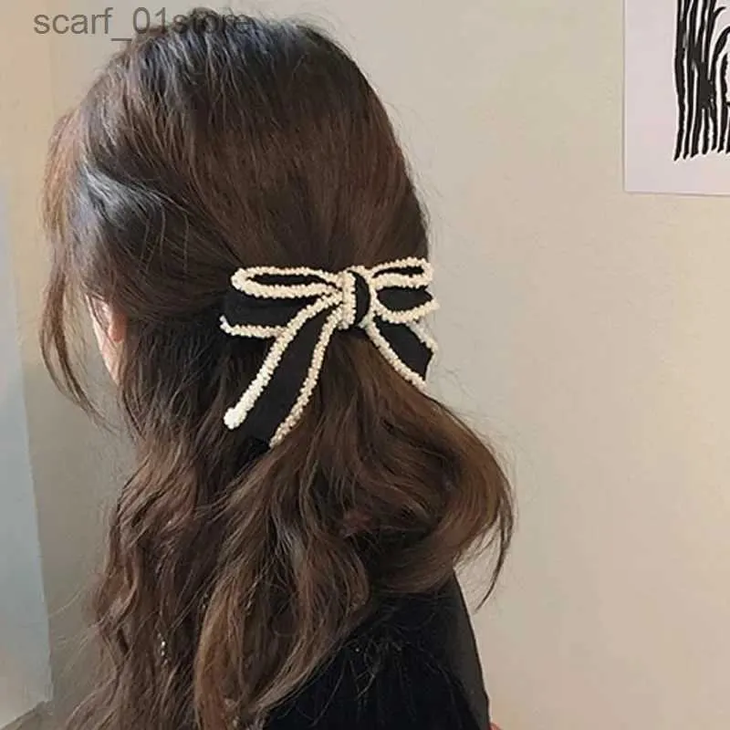 Huvudbonad hårtillbehör 2023 Nya koreanska vita kant Black Bow Hair Pin Elegant hårklipp Barrettes Headwear Girls Women Hair AccessoriesL231214