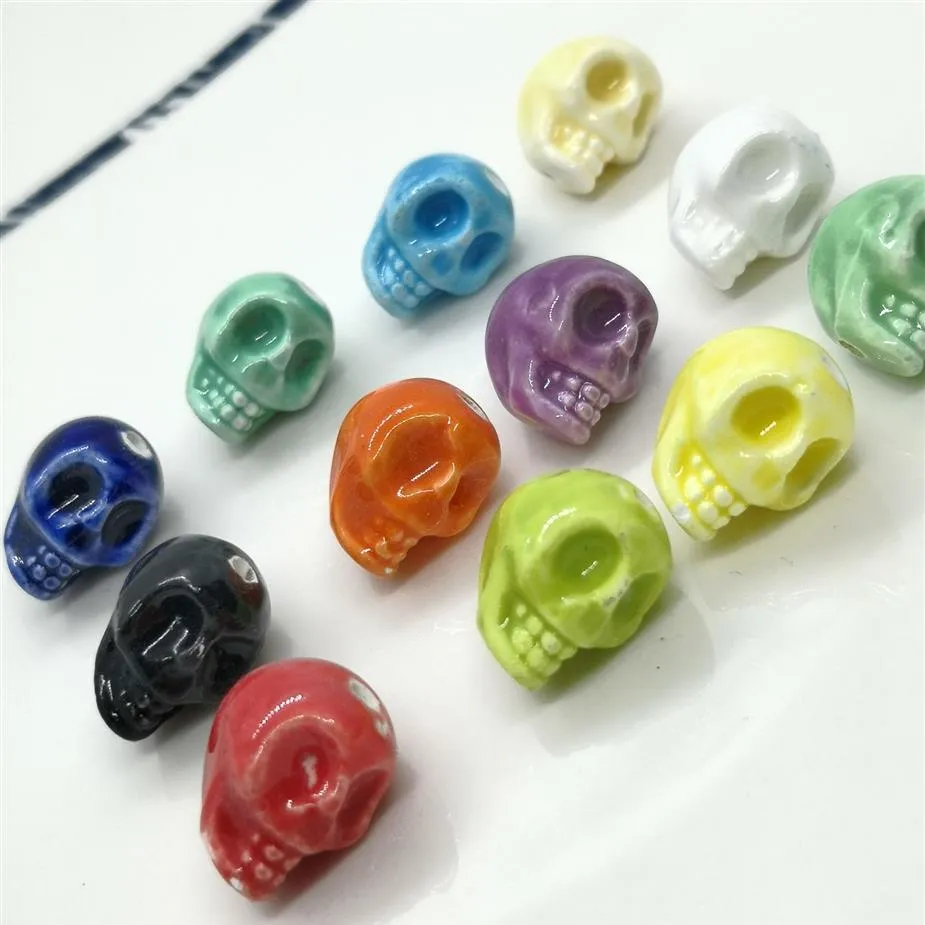 100 Uds lote cuentas de cerámica de calavera de colores mezclados 13x14mm Hole1 6mm cuentas de cerámica sueltas para fabricación de joyería accesorios de pulsera DIY 304b