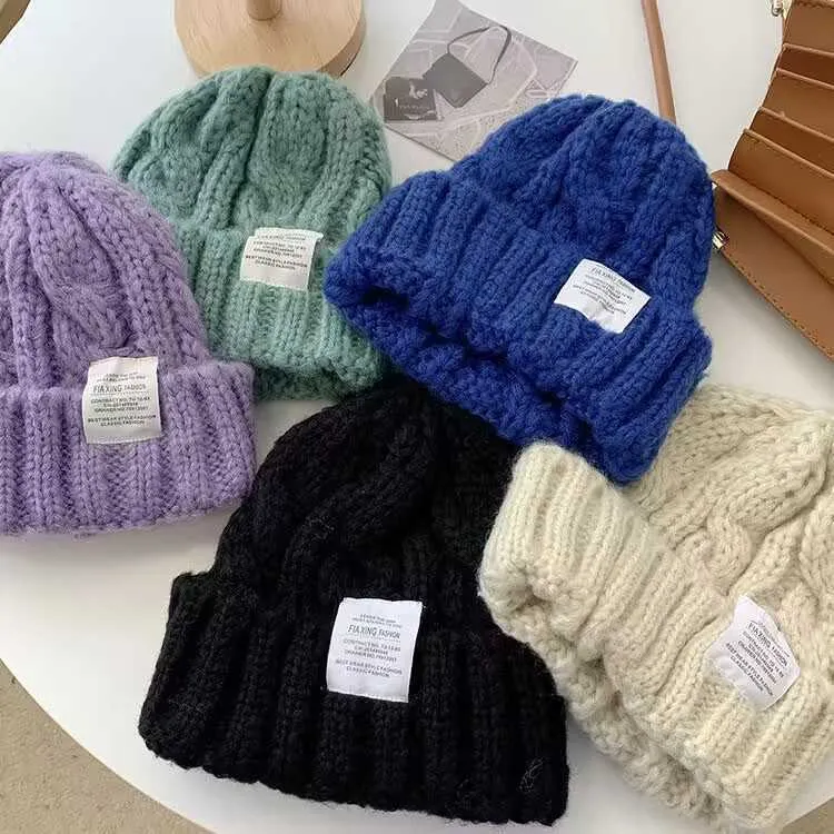 Cappello lavorato a maglia Marchio di moda per bambini Pasta fritta Twist Testa grande Wai Autunno e inverno Nuovo stile Baotou Studente Protezione per le orecchie Caldo colore puro Lana da uomo