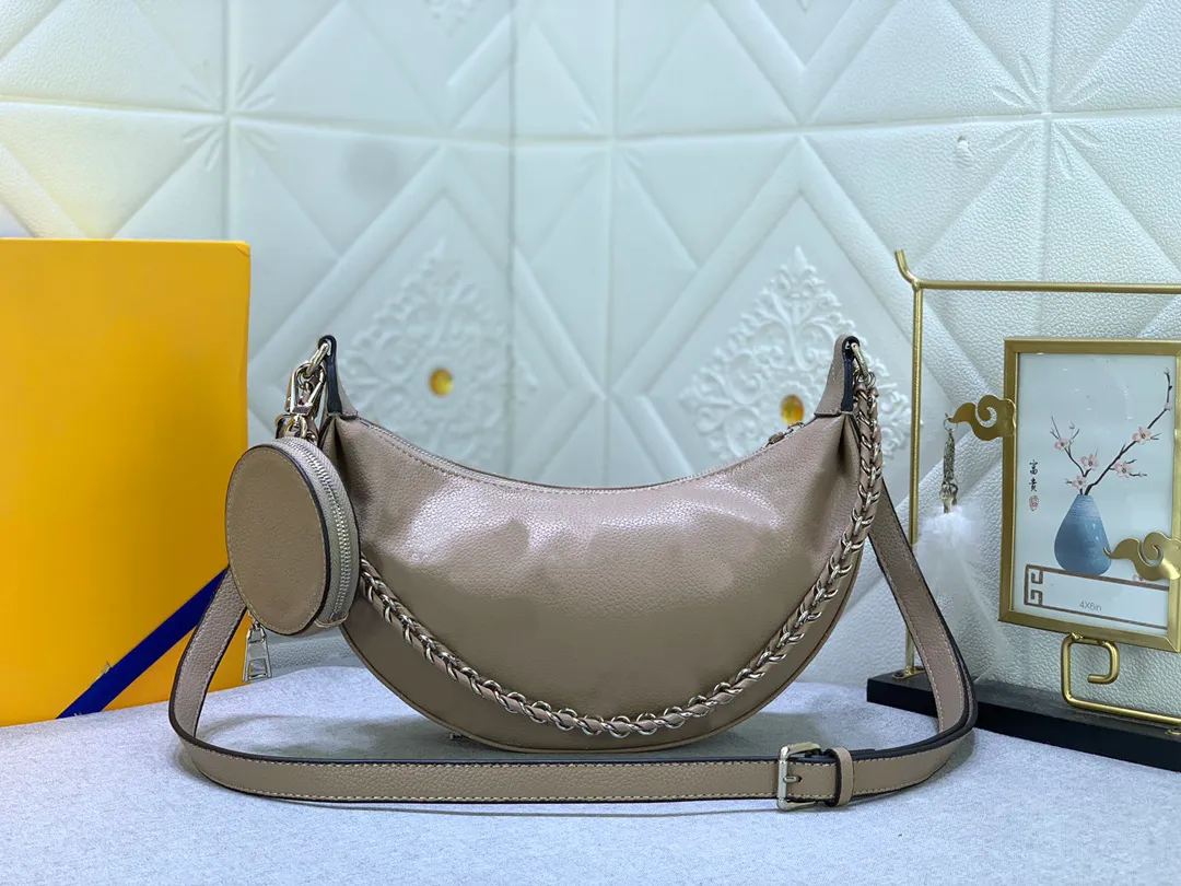 2023 Luxe designer tas geperforeerde koesleer kleine handtas met halve maan omtrek metaal geweven handvat gecombineerd met kleine nul portemonnee, schoudertas, crossbody tas 5a