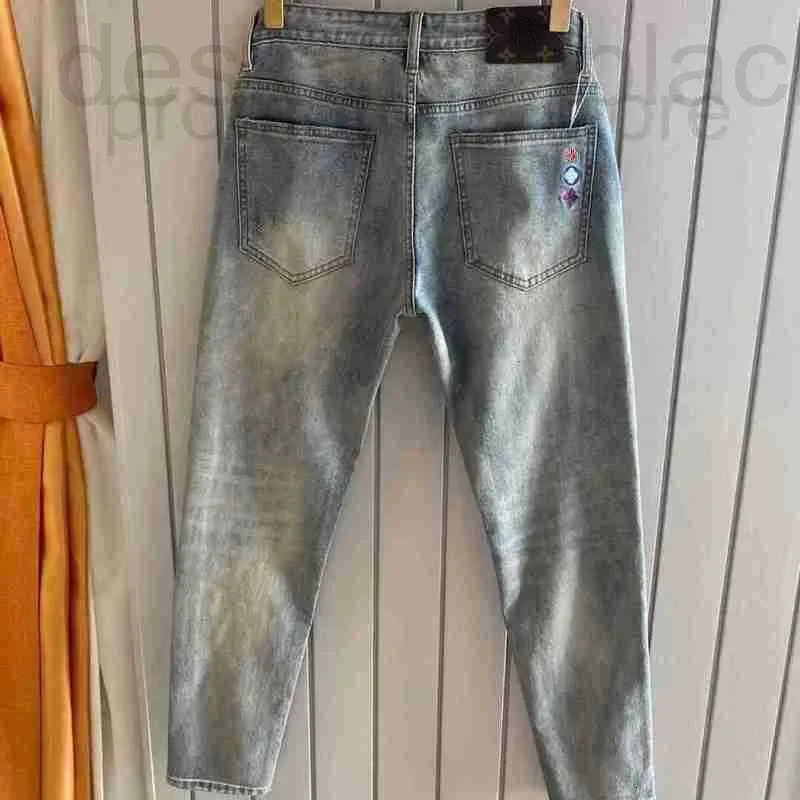 Mäns jeans designer jeans fjäder tryckt broderad stretch smal raka avslappnade byxor enkla och mångsidiga su liu tong style mz6v 3at9