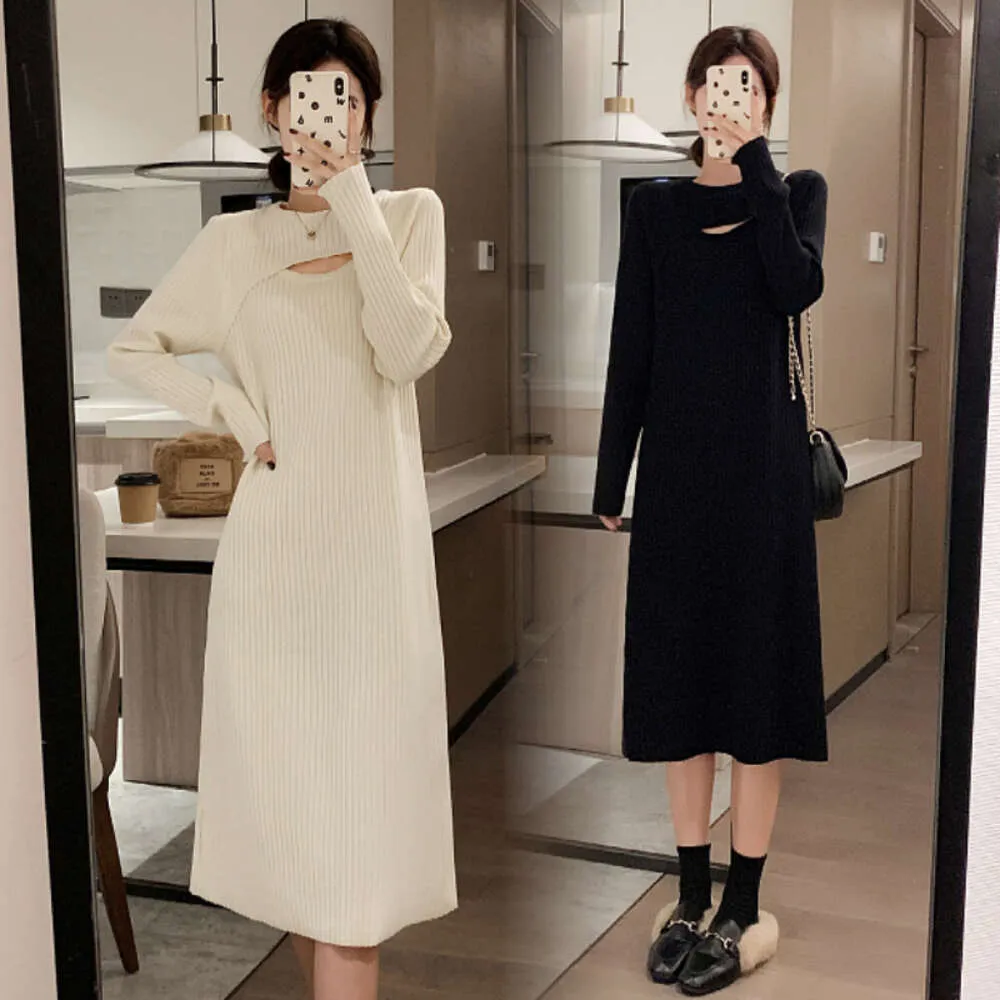 Autumn and Winter Korean Edition Hollow Out Design Feeling Long Sleeved Knitted Dress for Women Loose Mid Length Over Knee Sweater Bottom