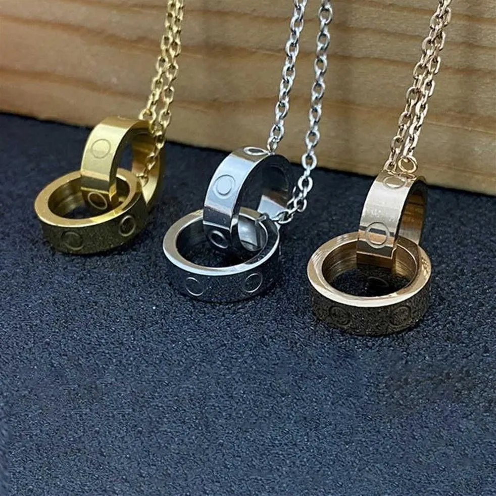 Pendanthalsband klassiska kärlekshalsband C68 dubbelring hänge designer diamant halsband mode kvinnor guld silver vridmoment med 194i