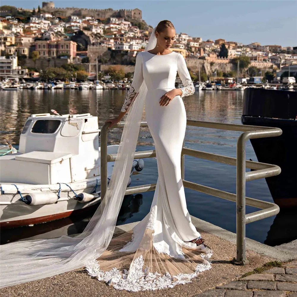 Long Sleeve mermaid wedding dress with Beaded Appliques, Scoop Neck, Button Back, Splice Train, and Bridal Gown Style