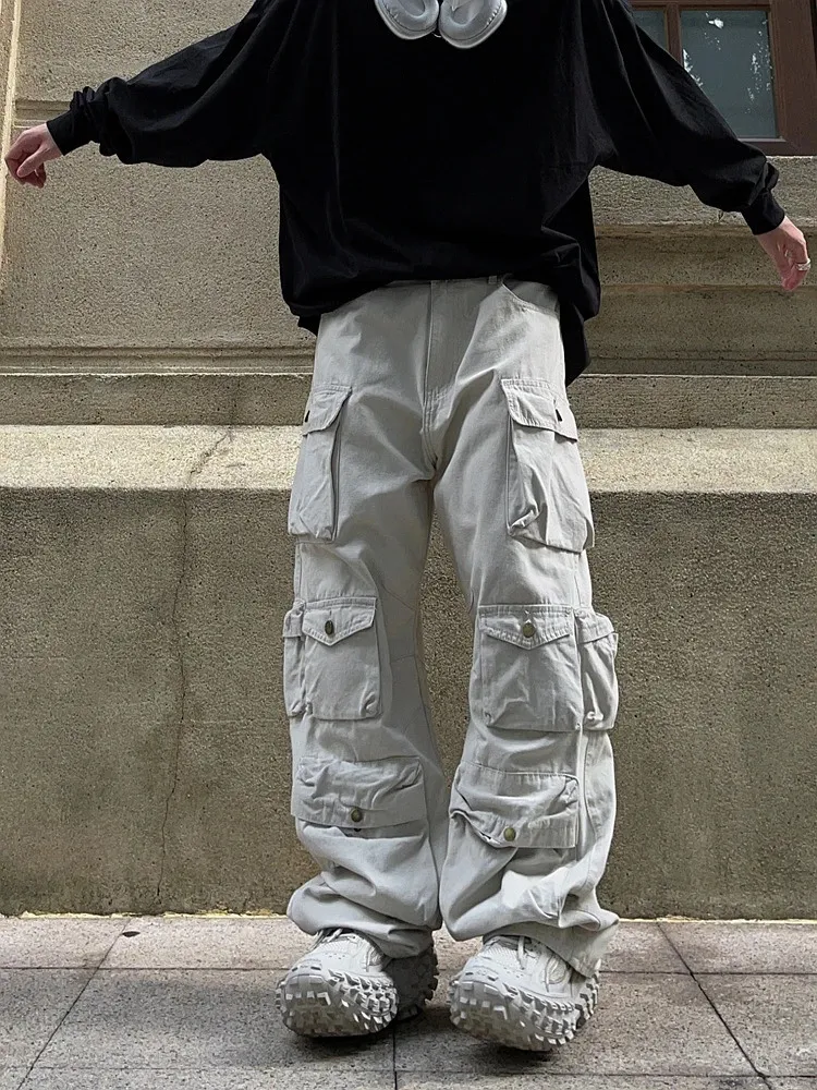 Mężczyzn Pants Street White Multi Pocket kombinezon HARAJUKU Style luźne swobodne spodnie proste mopujące jesień 231214