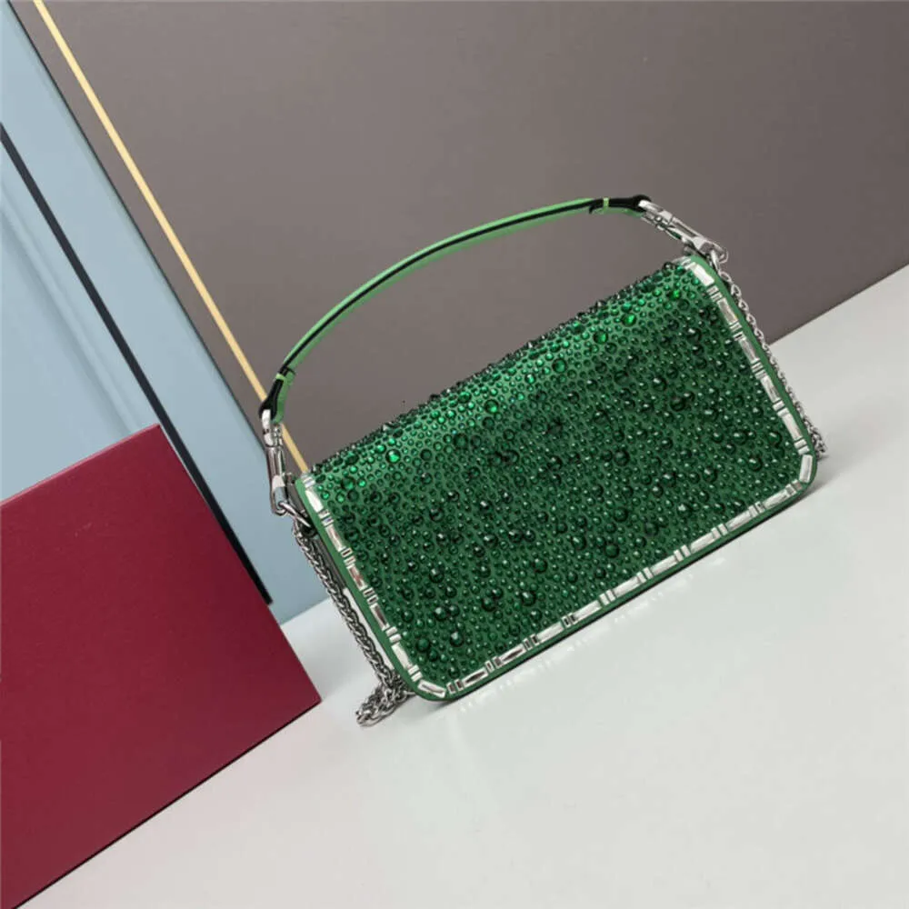 DHgate.com:Shiny Brass Crystal Mini Chain Handbag - Designer