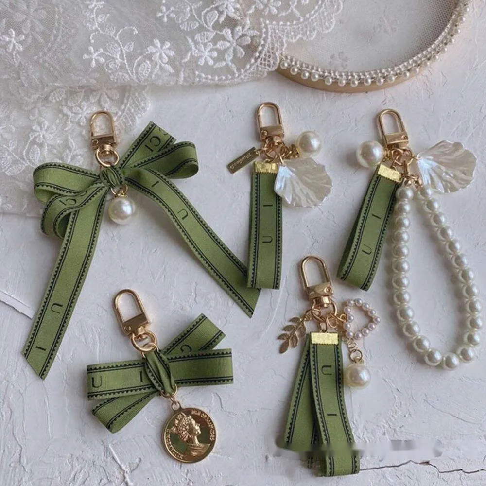 Ggst Keychains GGG Luxury Keychains Pearl Charm Key Rings With Green Ribbon And Shells ...